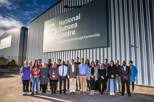 Group photograph of the NSC team outside the Centre